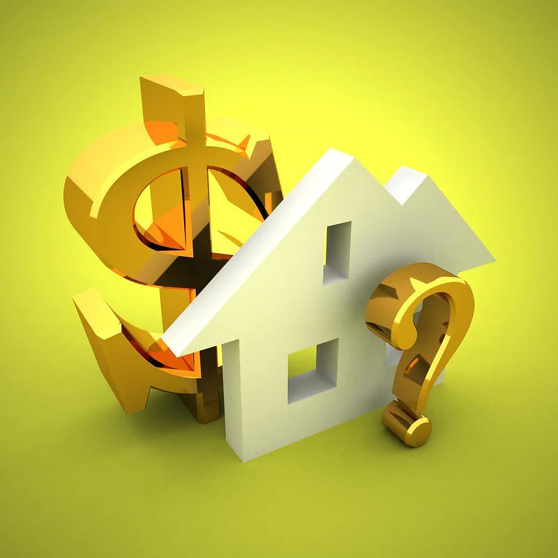 white house with gold dollar sign and question mark