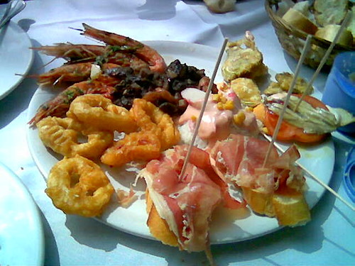 meat-and-seafood-sampler-plate-at-a-restaurant