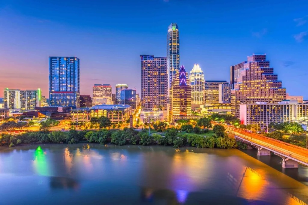 A picture containing sky, outdoor, city, river