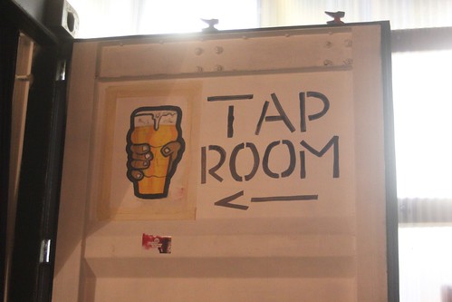 Sign Pointing You to the Tap Room
