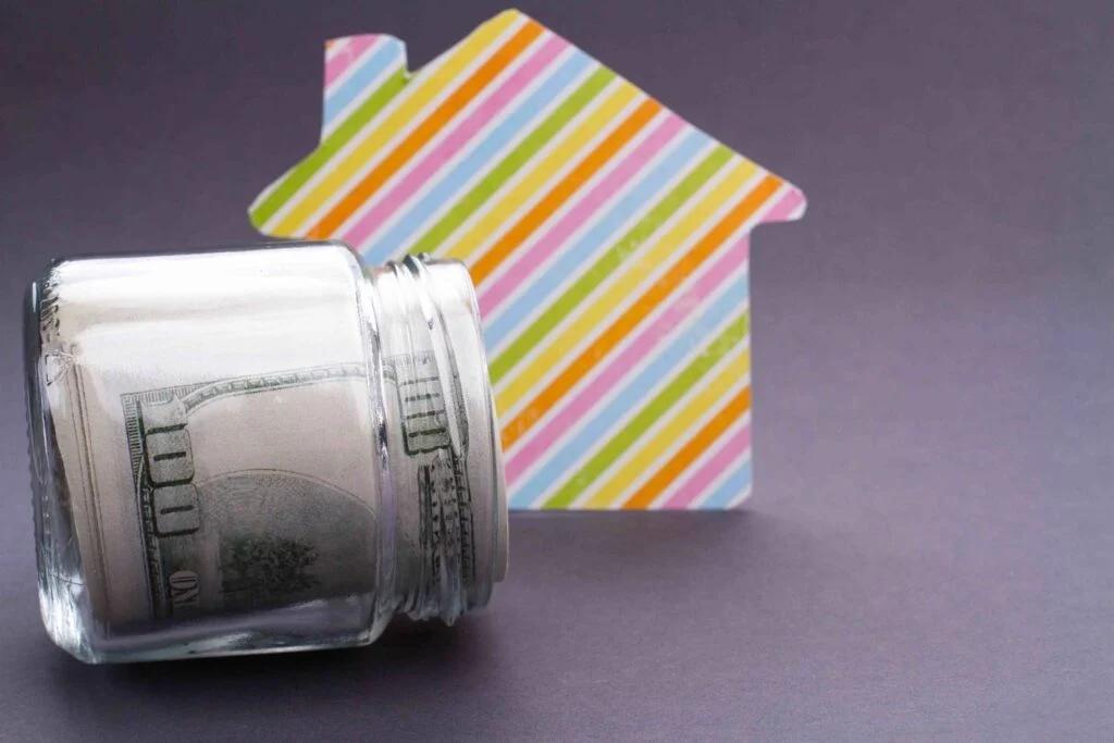 $100 bill with a rainbow colored arrow pointing upwards