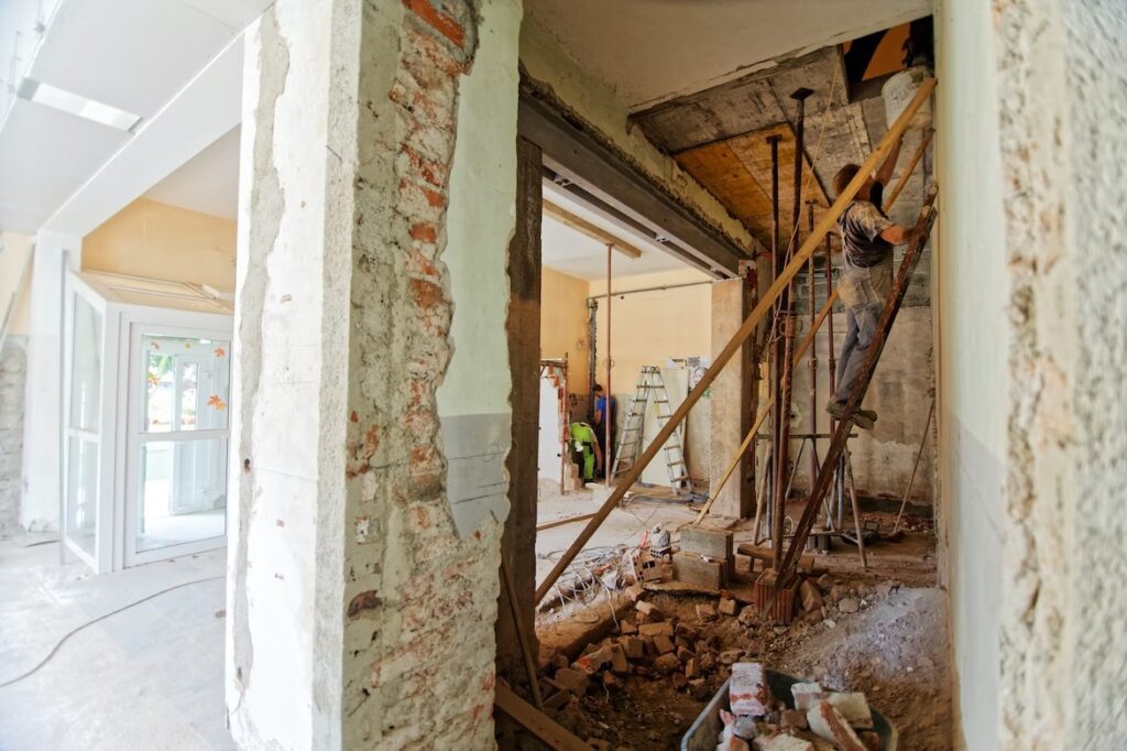 A house undergoing a demolition process during a house flip