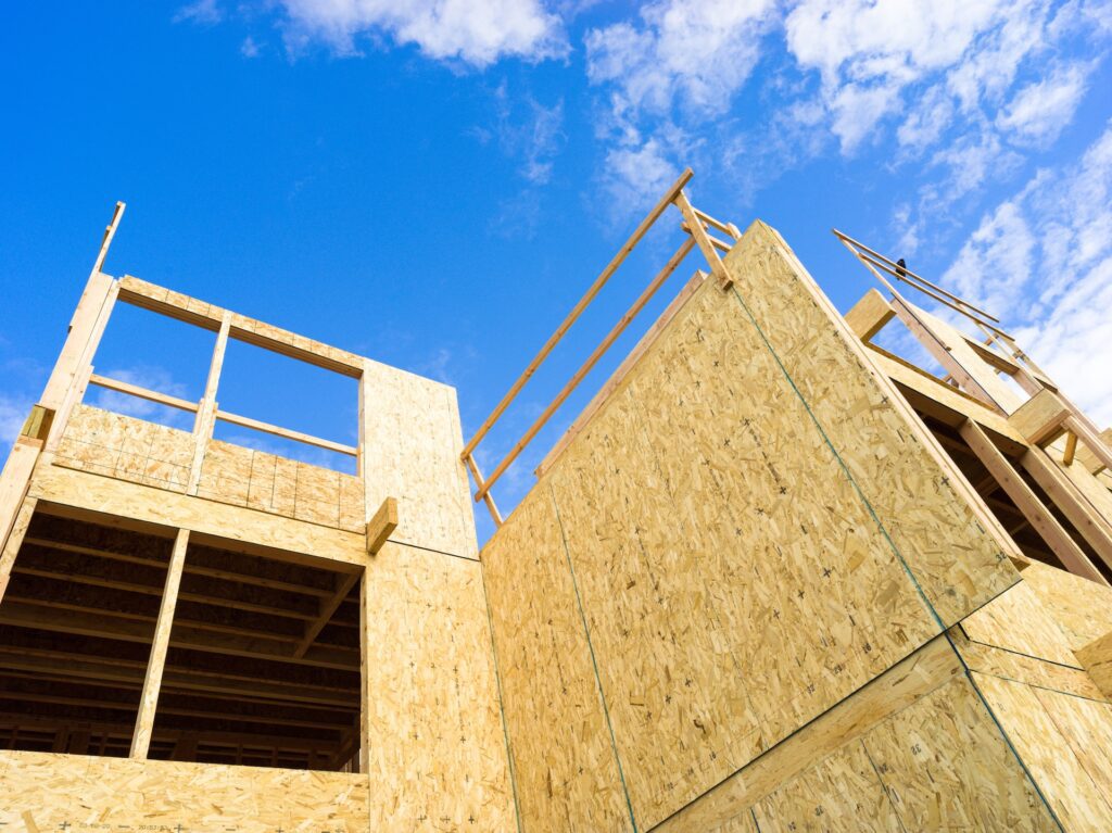 A new home under construction with the sky in the background