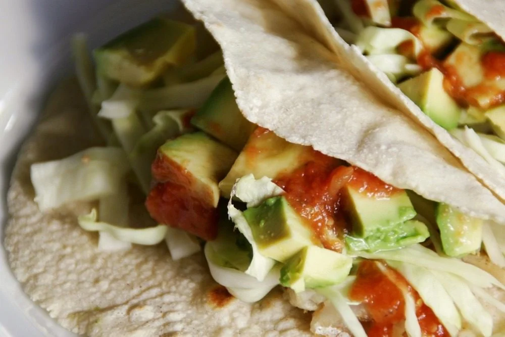 Up close photo of a fish taco from a Mexican restaurant