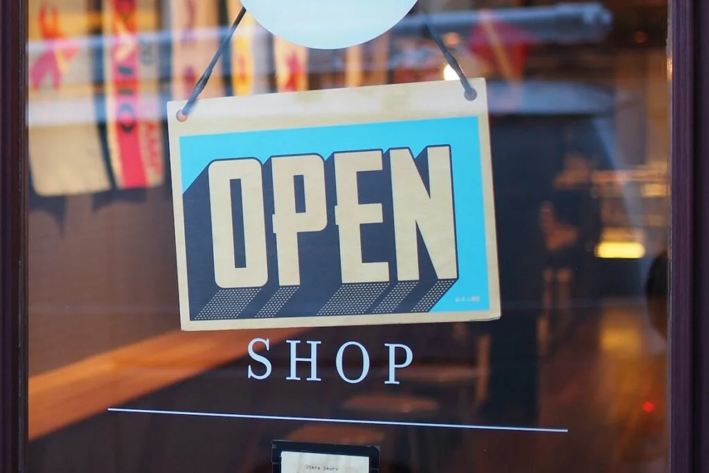 open sign on a store window